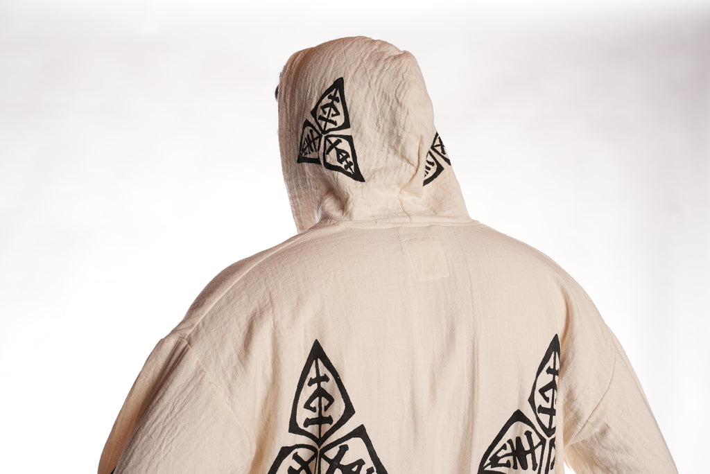 Back view of the Veni Vidi Vici Kimono highlighting the hood and large geometric symbols, handmade organic Turkish cotton robe with spiritual pattern.