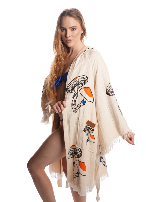 Model wearing the Organic Cotton Mushroom Kimono — lightweight, boho festival kimono with reversible mushroom pattern, designed in California.