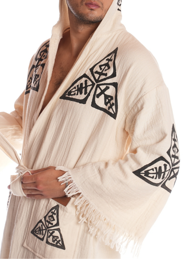 Veni Vidi Vici Kimono close-up shot showing the handcrafted geometric symbols on soft organic Turkish cotton, unisex boho kimono with hood, artisan spiritual pattern.