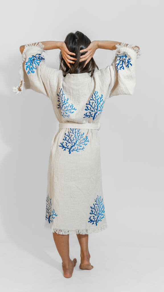 Back view of Organic Reef Kimono showing blue coral motif and relaxed unisex fit against a clean studio backdrop.